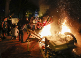 Американские погромы: кому выгодно обвинить Россию в беспорядках